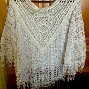 Womens open back crocheted 3/4 length blouse. Worn twice just not my style.